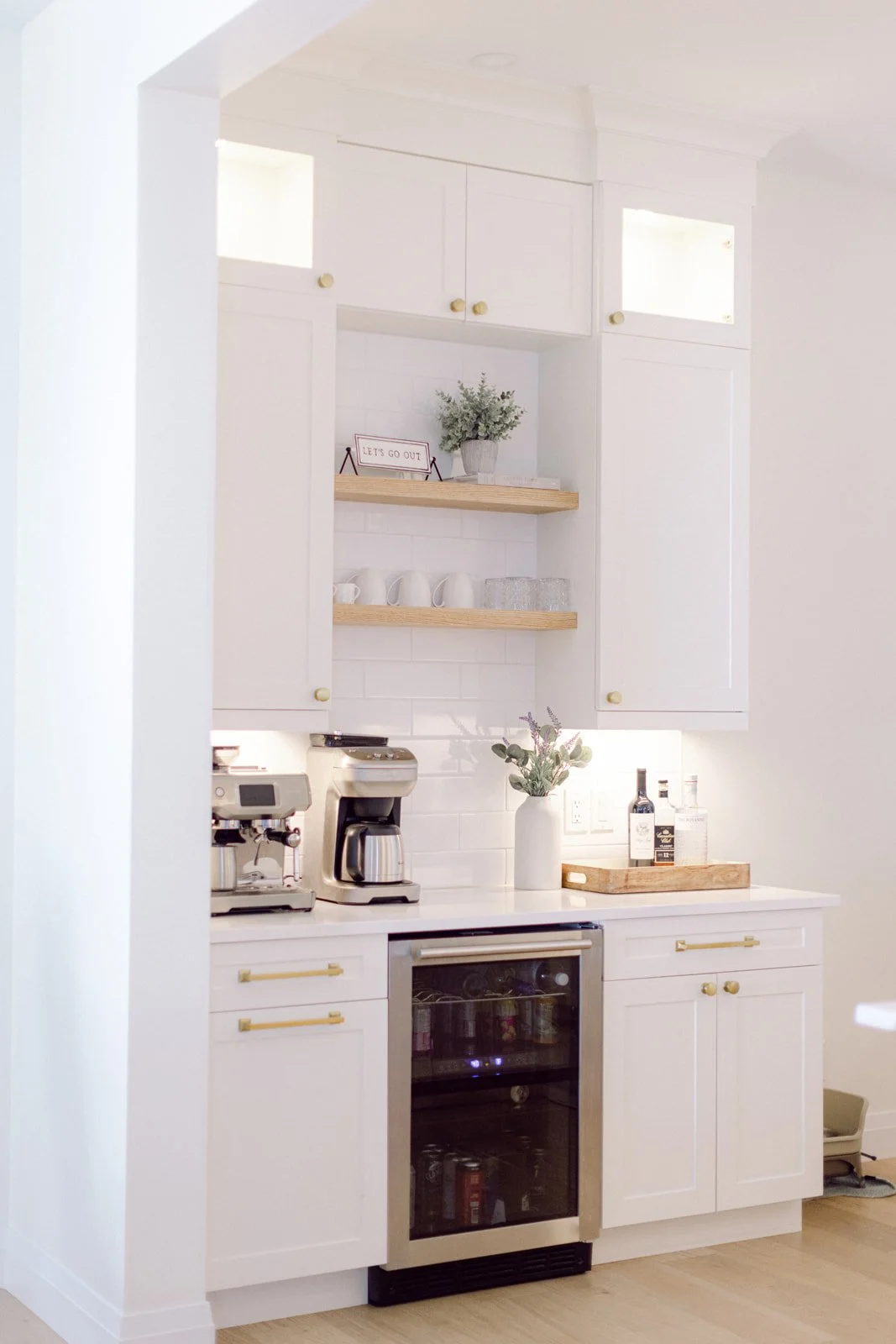 White modern-farmhouse custom home by Petvin Homes